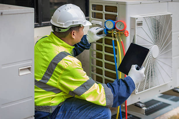 Professional Hvac technician working in Woodville, MA